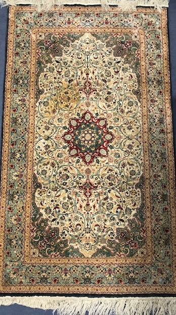 A Kashan style part silk rug 158 x 90cm